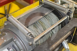 cable winch mounted on a yellow sheet