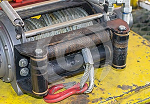 cable winch mounted on a yellow sheet