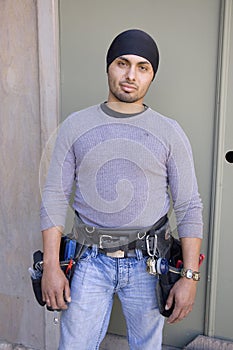 Cableman installing telephone