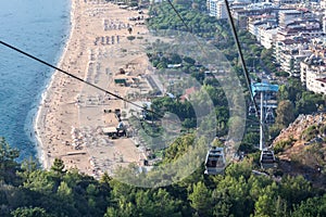 Cableroad from the lower station on beach to the Castle, view at the Kleopatra beach, the Alanya city, Turkey