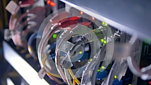 Cables plug to supercomputer for cryptocurrency mining. 4K.