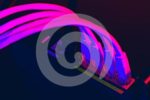 Cables plugged in a Wi-Fi router on dark background