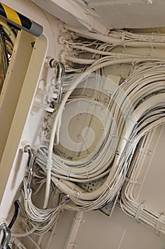 Cables and wires in ships corridor