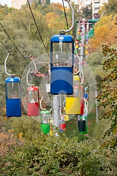 Cableway cabins track in autumn Kharkiv city park