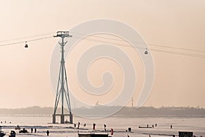 Cableway lift across the Songhua River in winter, skyline of Songhuajiang river in Harbin