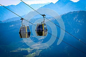 Cableway lift transportation in the alps mountains