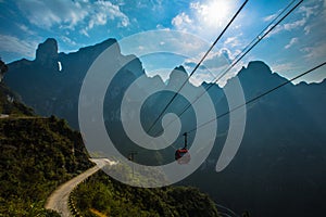 Cableway under blue sky in Tianmenshan mountain photo