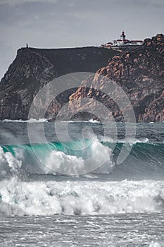 Cabo da Roca Lighthouse, the end of Europe with breaking waves