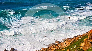 Cabo da Roca, Portugal. Lighthouse and cliffs over Atlantic Ocean, the most westerly point of the European mainland