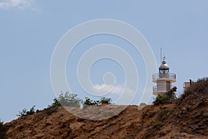 Coastal scene with the lighthouse of Cabo de las Huertas, in Alicante photo