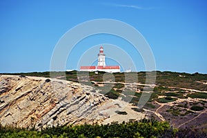 Cabo Espichel farol. Especial Cape lighthouse. Portugal. Landscape. Shipping. Help. Sky. Colorful background. Blue red green white photo