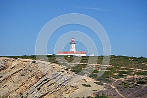 Cabo Espichel farol. Especial Cape lighthouse. Portugal. Landscape. Shipping. Help. Sky. Colorful background. Blue red green white photo