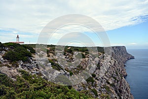 Cabo Espichel farol. Especial Cape lighthouse. Portugal. Landscape. Shipping. Help. Sky. Colorful background. Blue red green white photo