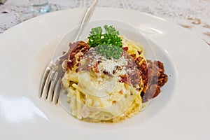 Cabonara with ham fried and cheese