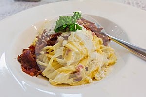 Cabonara with ham fried and cheese