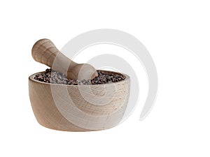 Cacao nibs in pestle on white