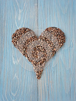 Cacao nibs shaped in heart symbol