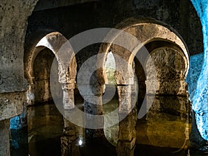 Caceres, Spain - Sep 28, 2021: Moorish cistern Aljibe in Caceres. Former mosque under the Muslim rule in Spain photo