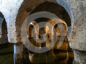 Caceres, Spain - Sep 28, 2021: Moorish cistern Aljibe in Caceres. Former mosque under the Muslim rule in Spain photo