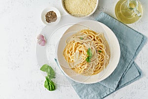 Cacio e pepe pasta. Spaghetti with parmesan cheese and pepper