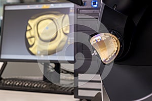 CAD CAM equipment modern extraoral laboratory dental scanner. Selective focus