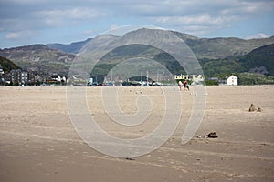 The cadair idris mountain range from barmouth beach