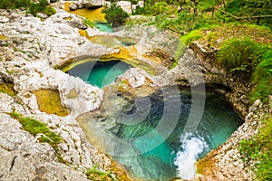 Cadini of Brenton, Sospirolo, Italy with azure clear water and m