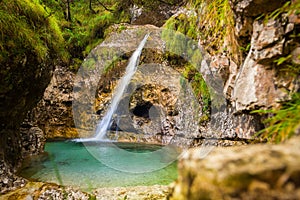 Cadini of Brenton, Sospirolo, Italy with azure clear water and m