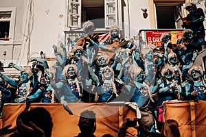 CADIZ/SPAIN-March:Cheerful local carnival chorus chirigota sings presenting prepared songs in the streets during the Carnaval of