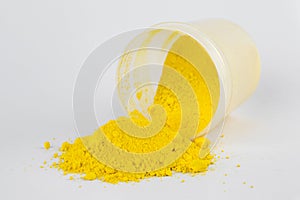 Cadmium Yellow pigment on a white background