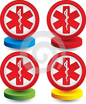 Caduceus medical symbol on colored discs