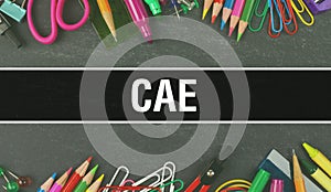 CAE text written on Education background of Back to School concept. CAE concept banner on Education sketch with school supplies. photo