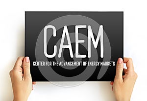CAEM - Center for the Advancement of Energy Markets acronym text on card, abbreviation concept background photo