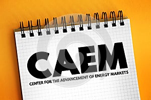 CAEM - Center for the Advancement of Energy Markets acronym text on notepad, abbreviation concept background photo