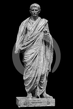 Caesar Octavianus Augustus roman emperor adopted son of Julius Caesar. Isolated statue on black