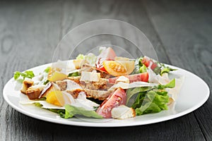 Caesar salad with chiken fillet and different