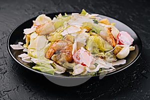 Caesar salad with grilled shrimp and parmesan cheese