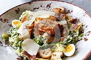 Caesar salad in a round plate