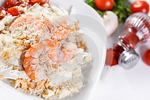 Caesar Salad with Royal shrimps . Comprises iceberg lettuce Leaf and croutons dressed with parmesan cheese. White light