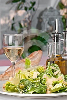 Caesar Salad and wine