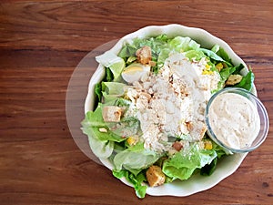 Caesar salad on a wooden table