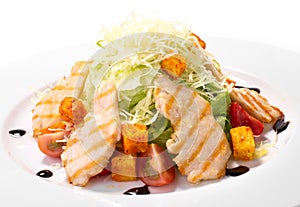 Caeser Salad with chicken and croutons photo