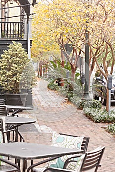 Cafe chairs on sidewalk Historic Savannah GA US