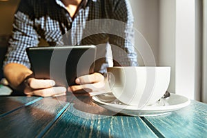 Cafe coffee man tablet computer closeup concept