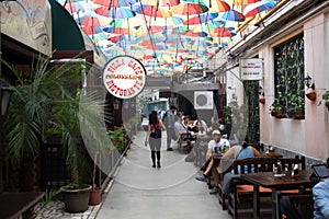 Cafe with colorful umbrellas on a street