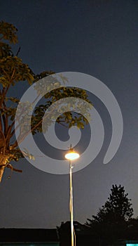 Cafe lamp and sunset