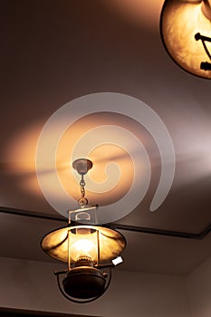 Cafe lamp yellow illumination lighting dark loft interior object vertical picture concept