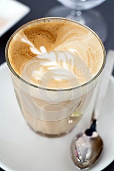 Cafe Latte in a glass photo