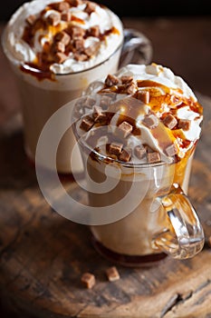 Cafe latte with whipped cream and caramel
