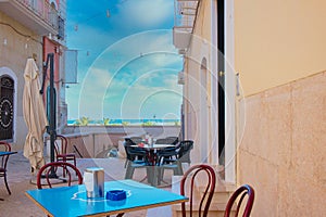 Cafe looking to the sea in Downtown Manfredonia, Foggia, Gargano, Italy